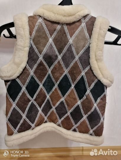 Меховая жилетка 122-128 для девочки натуральная