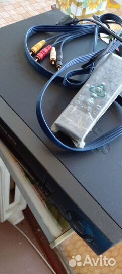 Видеокассеты с записью и видеомагнитофон Панасоник