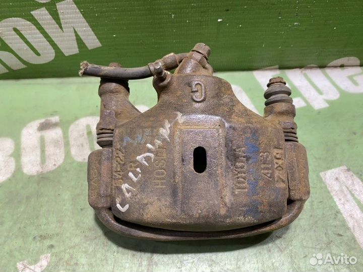 Суппорт тормозной передний правый Toyota Caldina