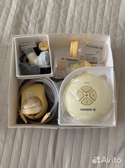 Молокоотсос medela электрический