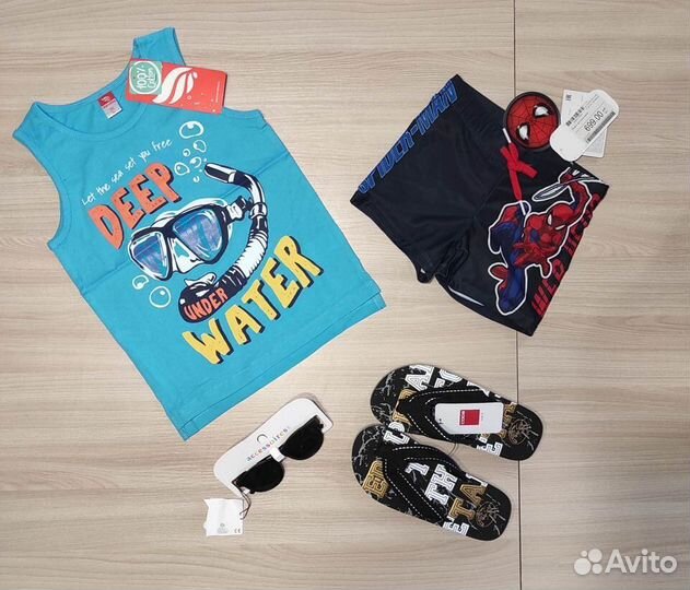Пакет новой одежды для мальчика р.110