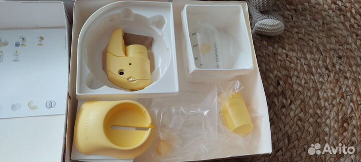 Молокоотсос medela электрический