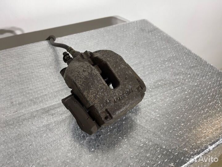 Суппорт тормозной задний левый Bmw X5 E70 N55B30