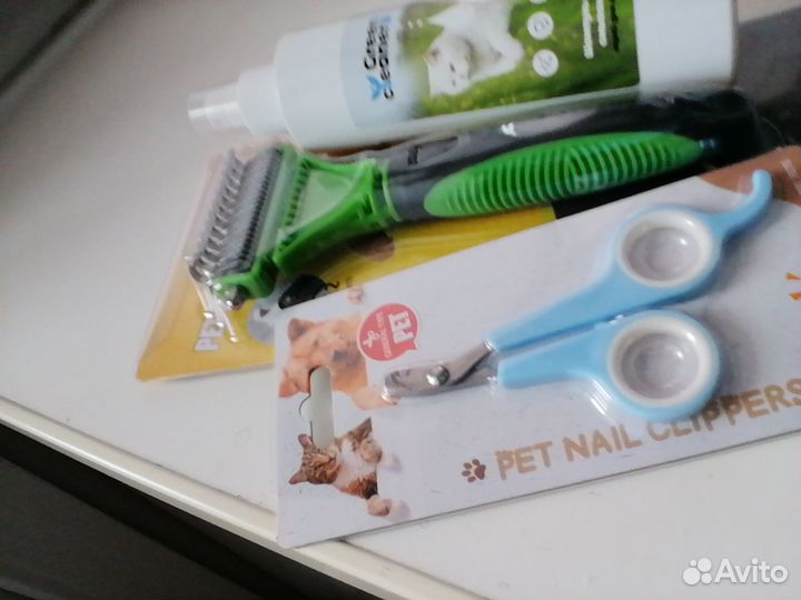 Сухой шампунь, расчёска, когтерезка для кошек