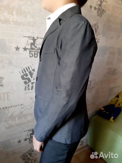 Костюм школьный для мальчика 128-130см. серый