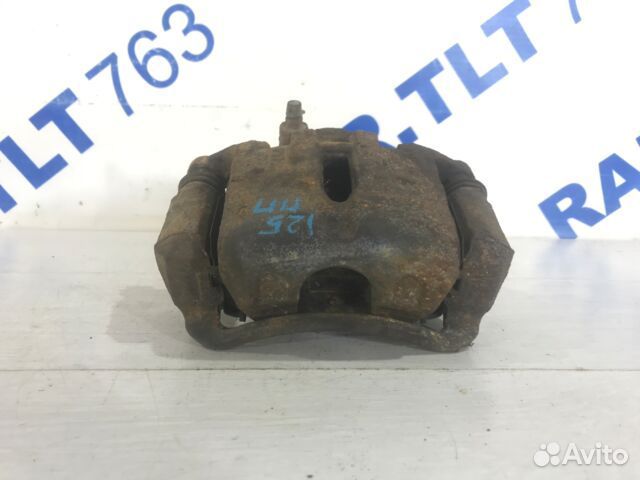 Суппорт передний правый KIA sportage 3 SL 2.0 мт