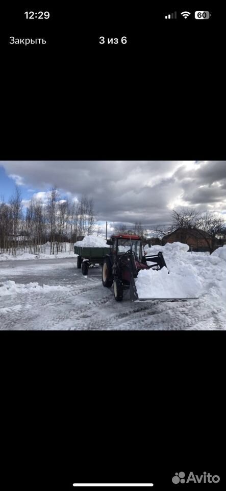 Уборка снега трактором