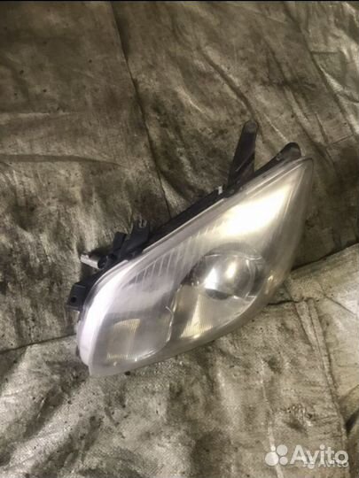 Фара левая хром toyota avensis T25 галоген