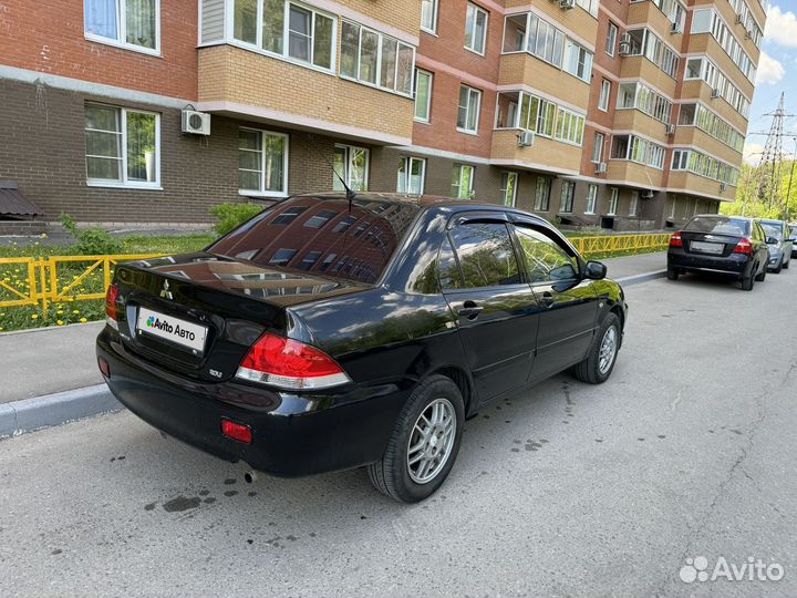Mitsubishi Lancer 1.6 AT, 2006, 146 000 км