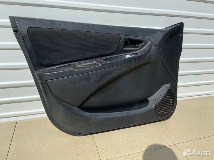 Обшивка двери передняя левая Geely мк