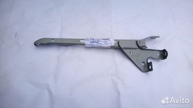 Toyota Corolla E210 кронштейн замка капота