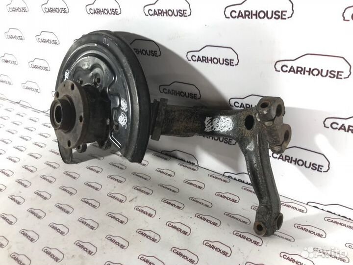 Кулак поворотный передний левый Volkswagen Passat