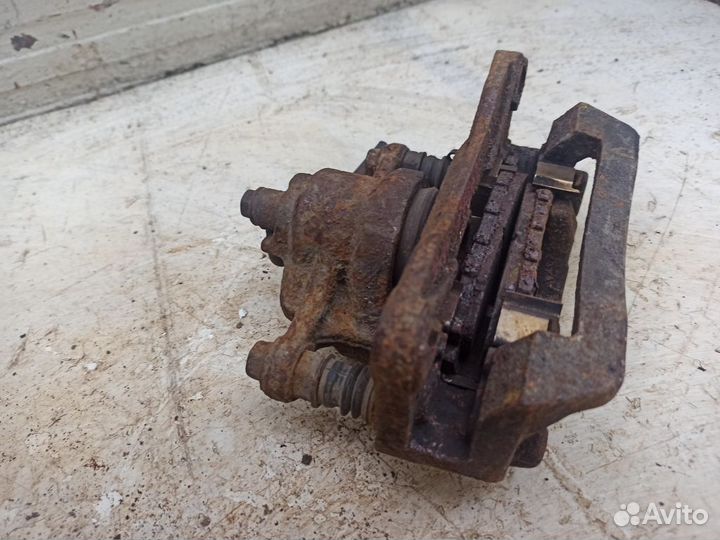 Суппорт задний левый