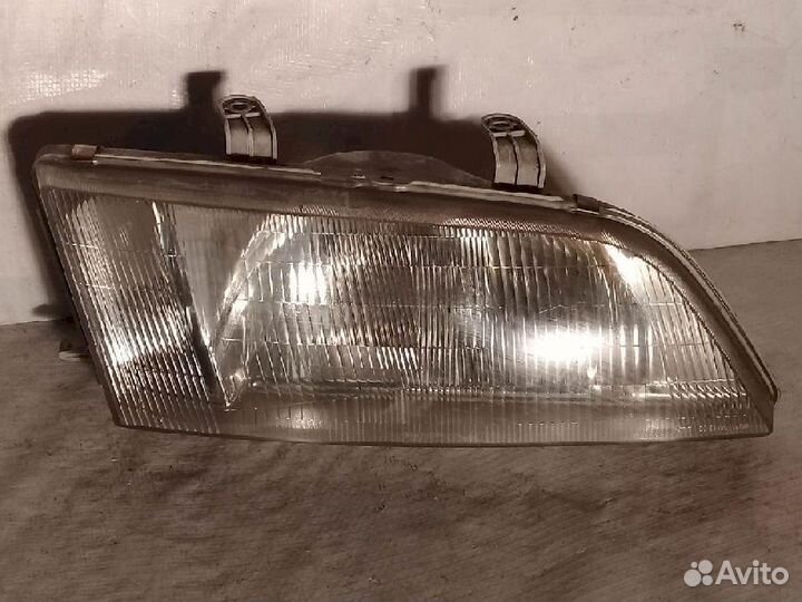 Фара правая 100-63396 Nissan Primera P11