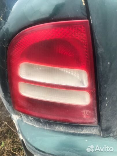 Фонарь задний левый Skoda Octavia Tour