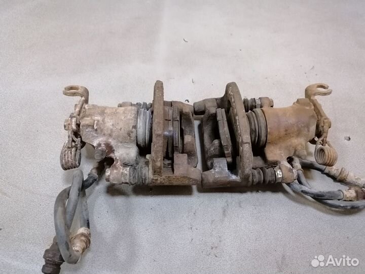 Суппорт тормозной задний для Mitsubishi Carisma