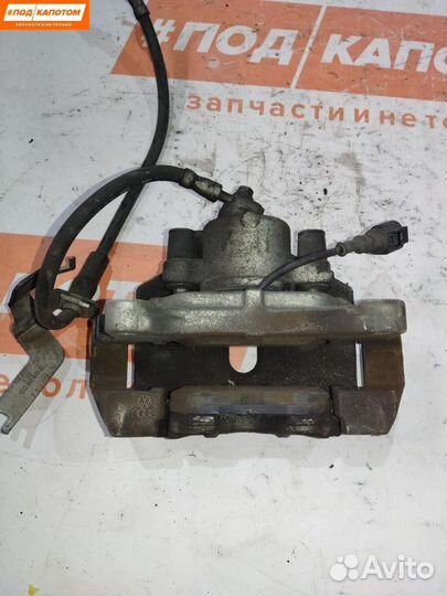 Суппорт тормозной передний левый Volkswagen