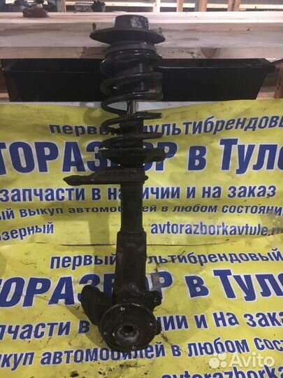 Стойка амортизатора переднего правого Chevrolet La