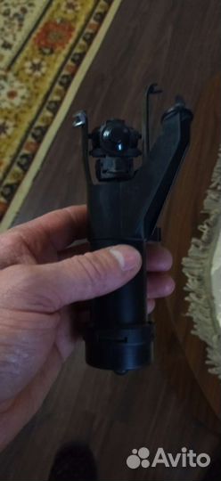 Форсунка омывателя фары Nissan Note e11