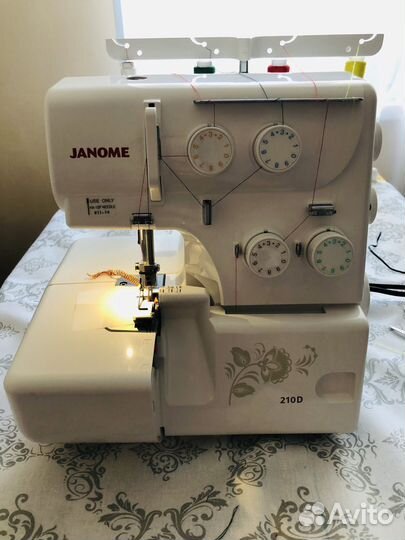 Оверлок Janome 210d