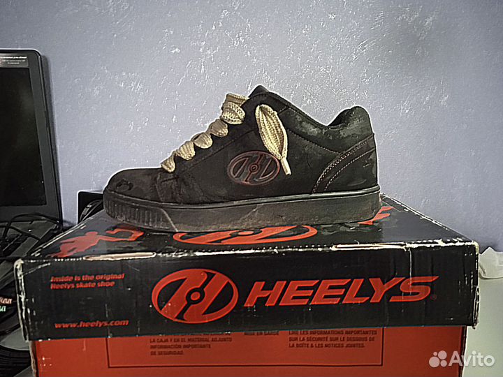 Кроссовки на роликах heelys