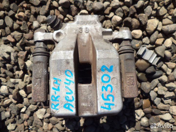 Суппорт задний левый Toyota Camry ACV40 2AZ-FE