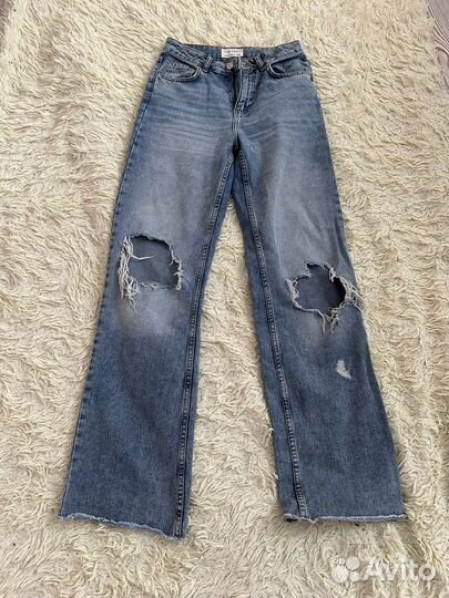 Джинсы клеш