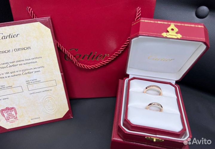 Обручальные кольца Cartier logo