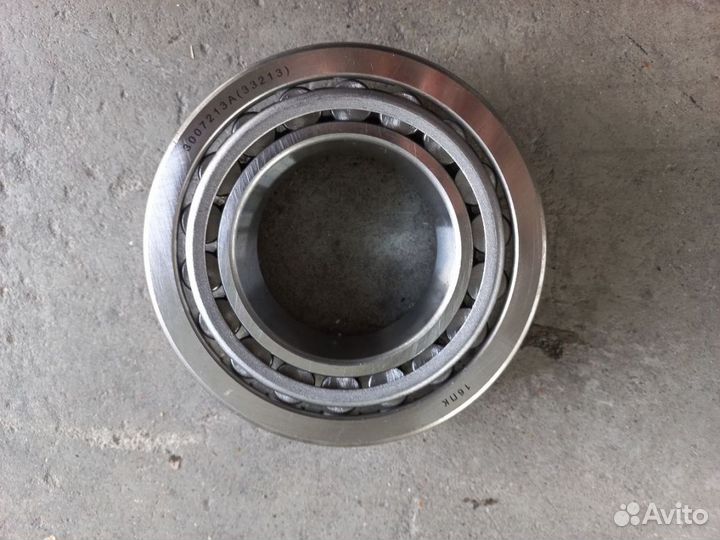 Роликовый подшипник ступицы наружный 33213