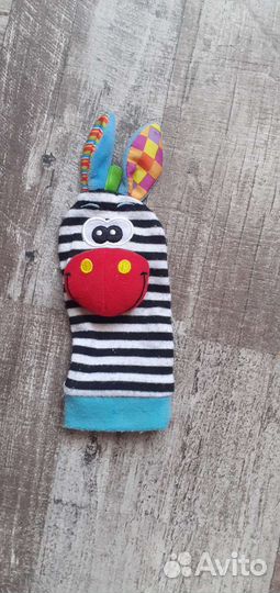Игрушка погремушка в виде зебры на руку