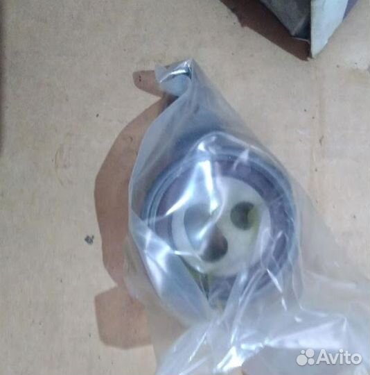 Ролик натяжной ремня грм mazda 626 GD / GE