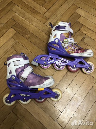 Роликовые коньки