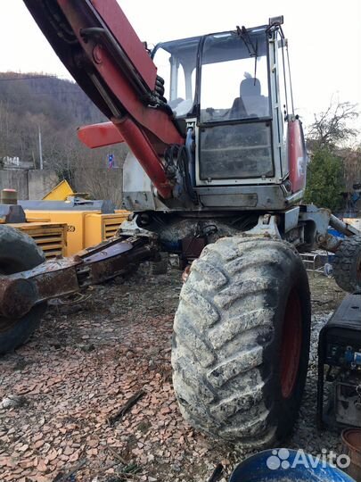 Колёсный экскаватор MENZI Muck A91 Mobil, 2003