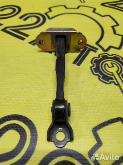 Ограничитель двери задний левый Nissan Primera