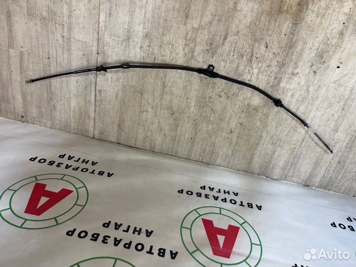 Трос стояночного тормоза задний левый Mitsubishi