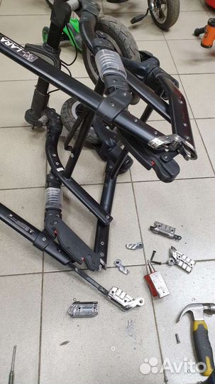 Ремонт механизма складывания детской коляски Adame