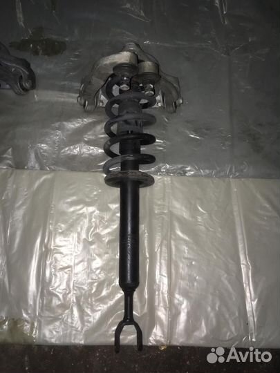Задний амортизатор Audi A6 2005
