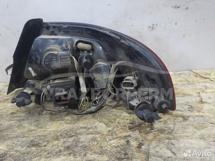 Фонарь задний левый Chrysler Sebring/Cirrus/Stratu