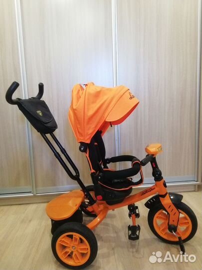 Детский трехколесный велосипед с ручкой