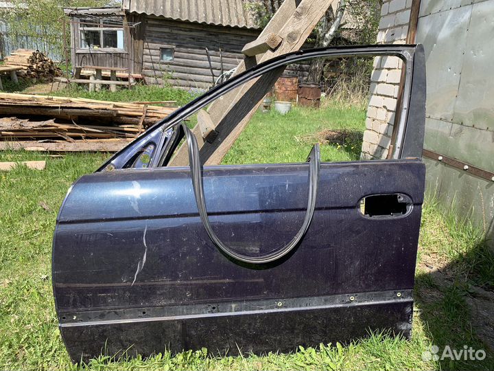 Левая дверь bmw е39
