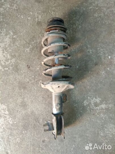 Амортизатор передний левый Шевроле Лачетти