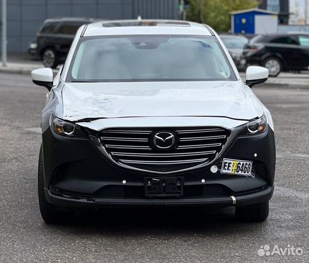 Суппорт тормозной передний Mazda Сх 9 TC PY 2019