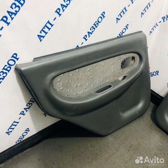 Обшивка двери задняя левая Kia Spectra 2001-2004