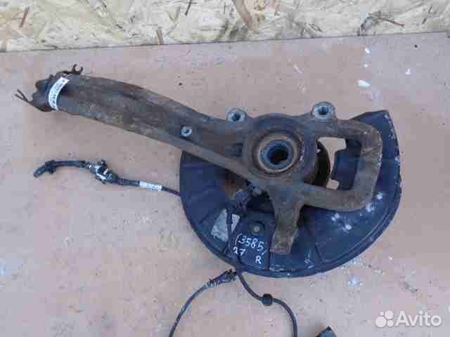 Кулак поворотный левый Audi Q7 4L 7L0407257A