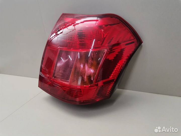 Фонарь задний левый Toyota Corolla Runx E120 2001