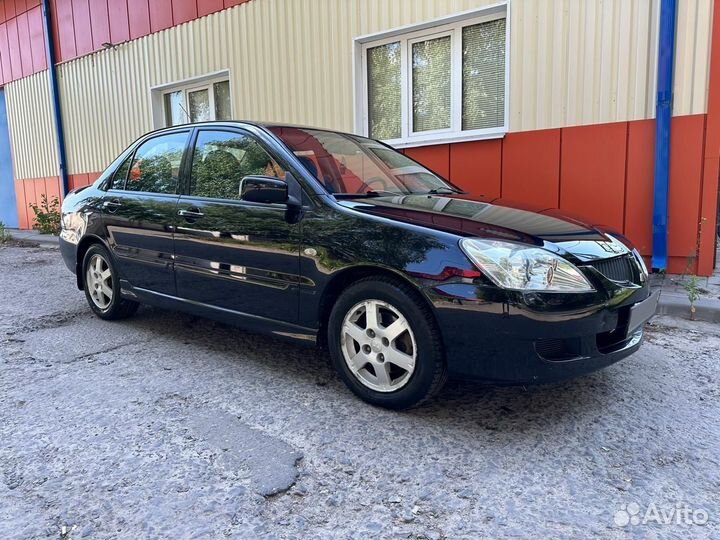 Mitsubishi Lancer 1.6 AT, 2005, 232 128 км