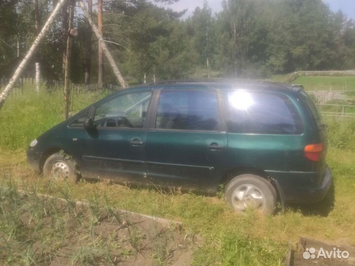 Замок капота sharan