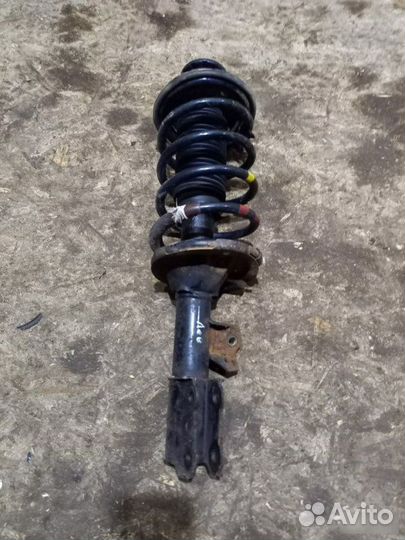 Стойка амортизатора левая Kia Picanto 1 2007—2011