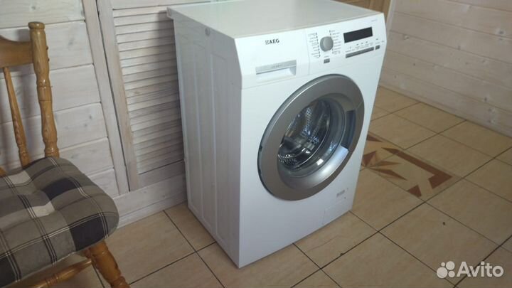 Узкая Стиральная машина AEG AMS 7000 U на 6 кг