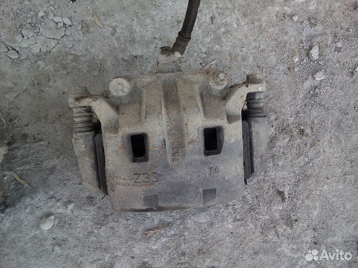 Суппорта передние Ниссан Навара Патфайндер